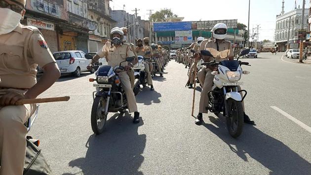 Policemen on motorcycles on patrol duty in Bhillwara. (ANI) Policemen on motorcycles on patrol duty in Bhillwara. (ANI)