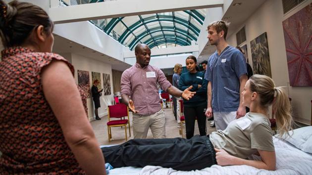 An instructor delivers a lesson at Stockholm’s Grand Hotel. The first round of training, part of the Skill Shift Initiative, for 30 SAS cabin crew took place on March 31, and another 300 will be trained in the coming weeks. SAS announced it was placing nearly 10,000 of its staff on furlough because of the drop in demand for flights amid the pandemic. (Jonathan Nackstrand / AFP) An instructor delivers a lesson at Stockholm’s Grand Hotel. The first round of training, part of the Skill Shift Initiative, for 30 SAS cabin crew took place on March 31, and another 300 will be trained in the coming weeks. SAS announced it was placing nearly 10,000 of its staff on furlough because of the drop in demand for flights amid the pandemic. (Jonathan Nackstrand / AFP)
