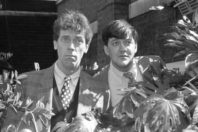 Returning to the familiar comforts of Wodehouse: Hugh Laurie and Stephen Fry appear in London together to promote ITV's Jeeves and Wooster on 4 May, 1990. (Photo by Jim James/PA Images via Getty Images)(PA Images via Getty Images)