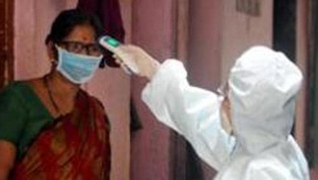 Mahim Dharavi Medical Practitioners Association uses thermal screening check their temperature on the residence of Kalyan wadi Netaji co-operative housing society as a precautionary measure against the spread of the coronavirus disease (COVID-19), in Mumbai on April 13, 2020. (ANI) Mahim Dharavi Medical Practitioners Association uses thermal screening check their temperature on the residence of Kalyan wadi Netaji co-operative housing society as a precautionary measure against the spread of the coronavirus disease (COVID-19), in Mumbai on April 13, 2020. (ANI)