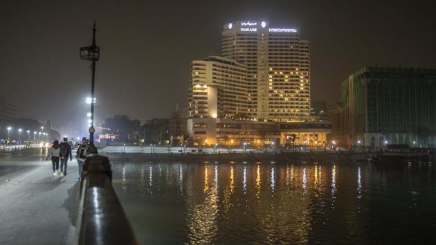 A view of the Kasr El Nile Bridge. Despite the mitigating measures taken by the country during the outbreak, many are already facing joblessness. (Nariman El-Mofty / AP) A view of the Kasr El Nile Bridge. Despite the mitigating measures taken by the country during the outbreak, many are already facing joblessness. (Nariman El-Mofty / AP)