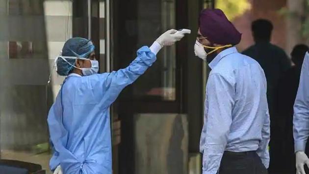 The guard and his family have been placed in home quarantine at their Okhla residence, after his sample was taken for testing at RML Hospital (Biplov Bhuyan/HT PHOTO) The guard and his family have been placed in home quarantine at their Okhla residence, after his sample was taken for testing at RML Hospital (Biplov Bhuyan/HT PHOTO)