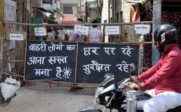A street closed for visitors during the nationwide lockdown imposed to contain the spread of COVID-19 pandemic, in Prayagraj. (PTI) A street closed for visitors during the nationwide lockdown imposed to contain the spread of COVID-19 pandemic, in Prayagraj. (PTI)