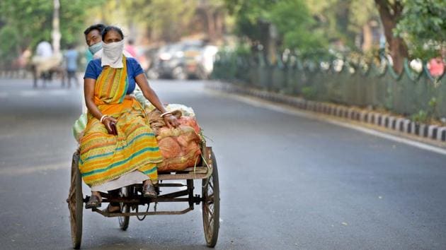 Hawkers set out to deliver fruits during the lockdown, at IP Extension in New Delhi on Thursday. (Sushil Kumar/HT PHOTO) Hawkers set out to deliver fruits during the lockdown, at IP Extension in New Delhi on Thursday. (Sushil Kumar/HT PHOTO)