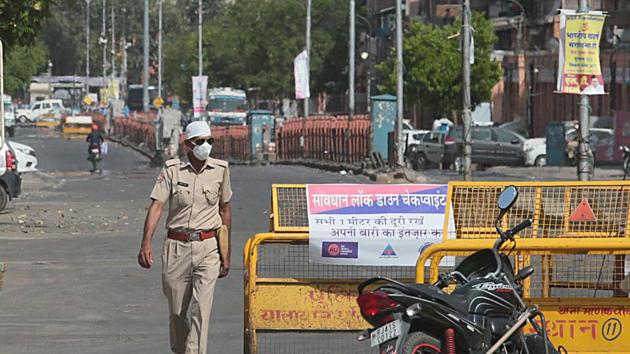 Police personnel on duty in Ramganj on day seventeen of the 21 day nationwide lockdown to curb the spread of coronavirus, in Jaipur. (Photo by Himanshu Vyas / Hindustan Times) Police personnel on duty in Ramganj on day seventeen of the 21 day nationwide lockdown to curb the spread of coronavirus, in Jaipur. (Photo by Himanshu Vyas / Hindustan Times)