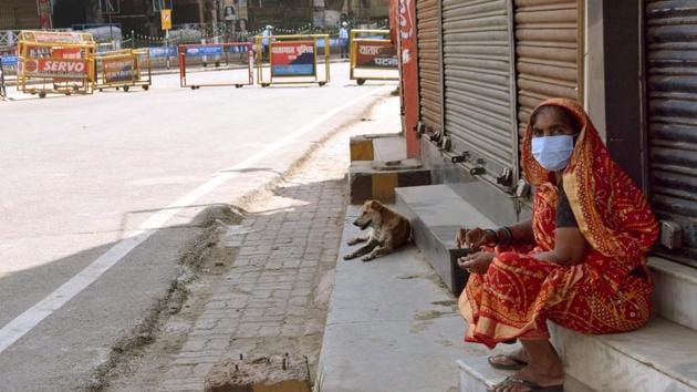 A woman is seen at Frazer road during the Covid-19 lockdown in Patna, Bihar on Thursday. (Santosh Kumar/HT Photo) A woman is seen at Frazer road during the Covid-19 lockdown in Patna, Bihar on Thursday. (Santosh Kumar/HT Photo)