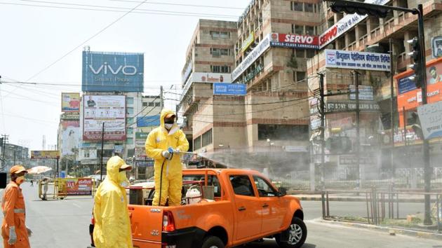 NDRF personnel sanitizing the Dak Bungalow area during lockdown against coronavirus, in Patna. (Santosh Kumar/ Hindustan Times) NDRF personnel sanitizing the Dak Bungalow area during lockdown against coronavirus, in Patna. (Santosh Kumar/ Hindustan Times)
