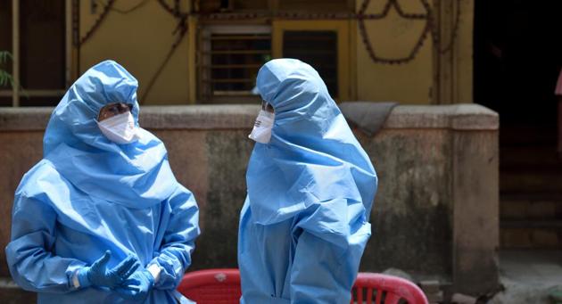Doctors conduct Covid-19 tests. (Satish Bate/HT Photo) Doctors conduct Covid-19 tests. (Satish Bate/HT Photo)
