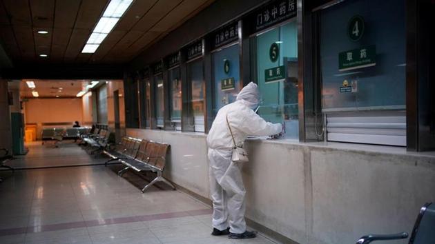 A woman wearing protective suit is seen at a hospital after the lockdown was lifted in Wuhan, capital of Hubei province and China's epicentre of the novel coronavirus disease (COVID-19) outbreak, April 13, 2020. (REUTERS) A woman wearing protective suit is seen at a hospital after the lockdown was lifted in Wuhan, capital of Hubei province and China's epicentre of the novel coronavirus disease (COVID-19) outbreak, April 13, 2020. (REUTERS)