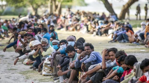 Covid-19 lockdown: People wait in lines on the banks of Yamuna River to be transferred to a shelter during a lockdown imposed due to the coronavirus in New Delhi on Wednesday, April 15, 2020. (Bloomberg) Covid-19 lockdown: People wait in lines on the banks of Yamuna River to be transferred to a shelter during a lockdown imposed due to the coronavirus in New Delhi on Wednesday, April 15, 2020. (Bloomberg)