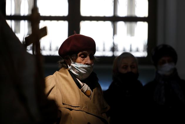 A woman wearing a protective face mask prays during a service at the cathedral on the eve of the Orthodox Easter, amid the coronavirus disease (COVID-19) outbreak in Stavropol, Russia April 18, 2020. REUTERS/Eduard Korniyenko(REUTERS) A woman wearing a protective face mask prays during a service at the cathedral on the eve of the Orthodox Easter, amid the coronavirus disease (COVID-19) outbreak in Stavropol, Russia April 18, 2020. REUTERS/Eduard Korniyenko(REUTERS)