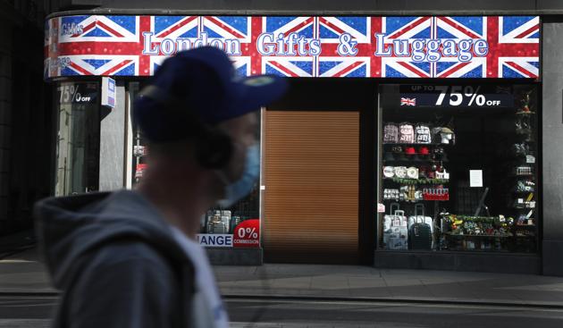 A closed tourist souvenir shop on Oxford Street in London, as the country is in lockdown to help curb the spread of the coronavirus, Wednesday, April 15, 2020. (AP) A closed tourist souvenir shop on Oxford Street in London, as the country is in lockdown to help curb the spread of the coronavirus, Wednesday, April 15, 2020. (AP)