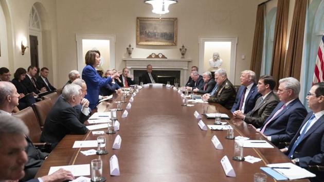 President Donald Trump, center right, meets with House Speaker Nancy Pelosi, standing left, Congressional leadership and others. (AP) President Donald Trump, center right, meets with House Speaker Nancy Pelosi, standing left, Congressional leadership and others. (AP)