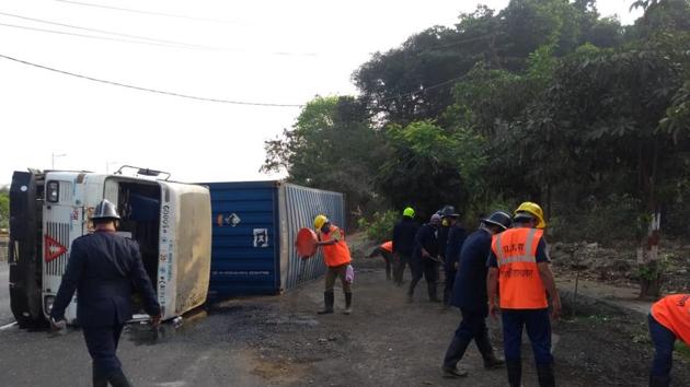 Regional Disaster Management Cell officials at Ghodbunder Road on Sunday. Regional Disaster Management Cell officials at Ghodbunder Road on Sunday.