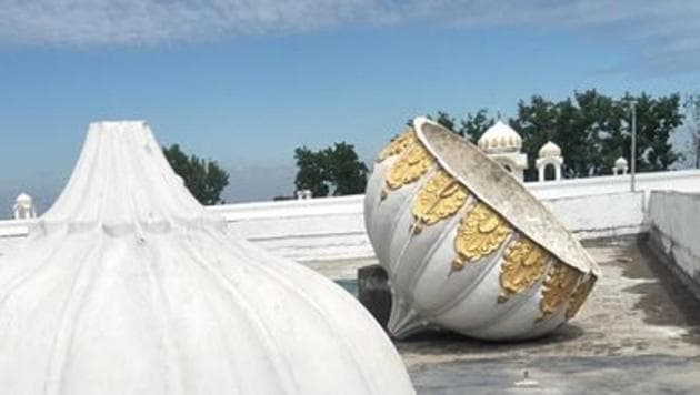 The storm-ravaged domes at the recently renovated Sikh shrine Gurdwara Darbar Sahib in Kartarpur. (HT PHOTO) The storm-ravaged domes at the recently renovated Sikh shrine Gurdwara Darbar Sahib in Kartarpur. (HT PHOTO)