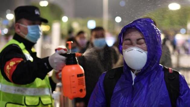 The Chinese government ordered on Saturday that anyone in Wuhan working in certain service-related jobs must take a coronavirus test if they want to leave the city. (Reuters file photo) The Chinese government ordered on Saturday that anyone in Wuhan working in certain service-related jobs must take a coronavirus test if they want to leave the city. (Reuters file photo)