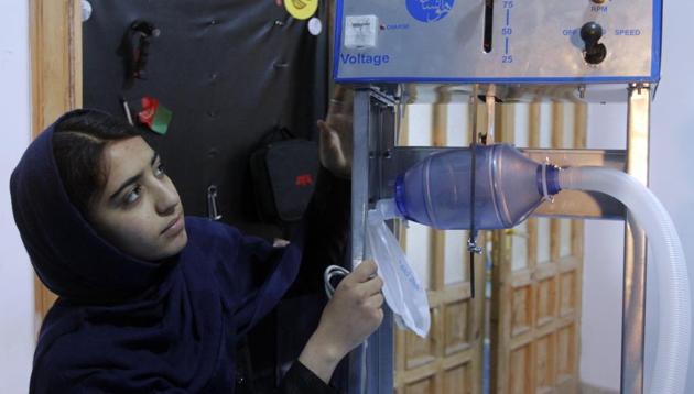 Somaya Farooqi works with a team of five young girls is developing cheap ventilators from Toyota car spare parts to help the fight against the coronavirus pandemic in Herat, west of Kabul, Afghanistan. (AP) Somaya Farooqi works with a team of five young girls is developing cheap ventilators from Toyota car spare parts to help the fight against the coronavirus pandemic in Herat, west of Kabul, Afghanistan. (AP)