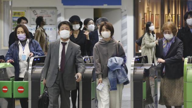 A combined total including 712 others from a cruise ship quarantined near Tokyo earlier this year came to 11,073, with 174 deaths. (AP file photo) A combined total including 712 others from a cruise ship quarantined near Tokyo earlier this year came to 11,073, with 174 deaths. (AP file photo)