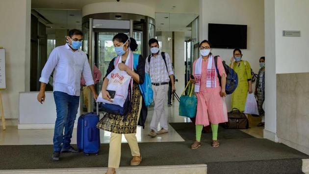 Medics leave for their homes after completing mandatory 14-days of quarantine at Taj Vivanta Hotel during a nationwide lockdown in the wake of coronavirus pandemic, in Guwahati on Monday. (PTI) Medics leave for their homes after completing mandatory 14-days of quarantine at Taj Vivanta Hotel during a nationwide lockdown in the wake of coronavirus pandemic, in Guwahati on Monday. (PTI)