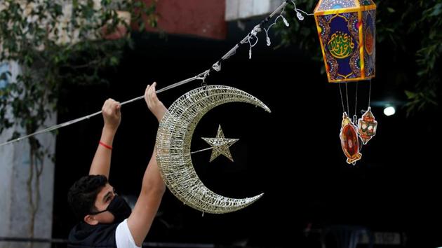 A man puts Ramadan decorations on a street ahead of the Muslim holy month of Ramadan, during a countrywide lockdown over the coronavirus disease (COVID-19) in Beirut, Lebanon April 19, 2020. Picture taken April 19, 2020. REUTERS/Mohamed Azakir(REUTERS) A man puts Ramadan decorations on a street ahead of the Muslim holy month of Ramadan, during a countrywide lockdown over the coronavirus disease (COVID-19) in Beirut, Lebanon April 19, 2020. Picture taken April 19, 2020. REUTERS/Mohamed Azakir(REUTERS)