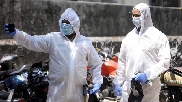 Police personnel wearing PPE (ANI photo) Police personnel wearing PPE (ANI photo)