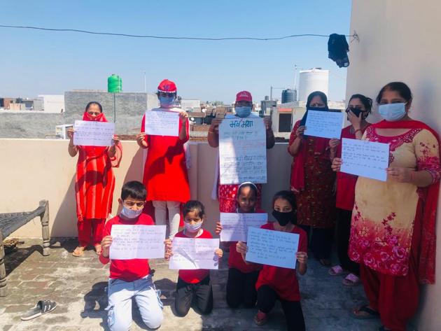 Aanganwadi workers staging the protest in Ludhiana. (ht photo) Aanganwadi workers staging the protest in Ludhiana. (ht photo)
