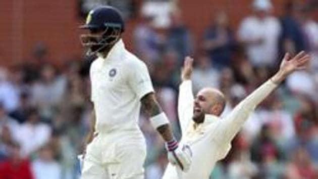 Australia's Nathan Lyon appeals for the wicket of India's Cheteshwar Pujara as India's Virat Kohli, left, watches. (AP) Australia's Nathan Lyon appeals for the wicket of India's Cheteshwar Pujara as India's Virat Kohli, left, watches. (AP)