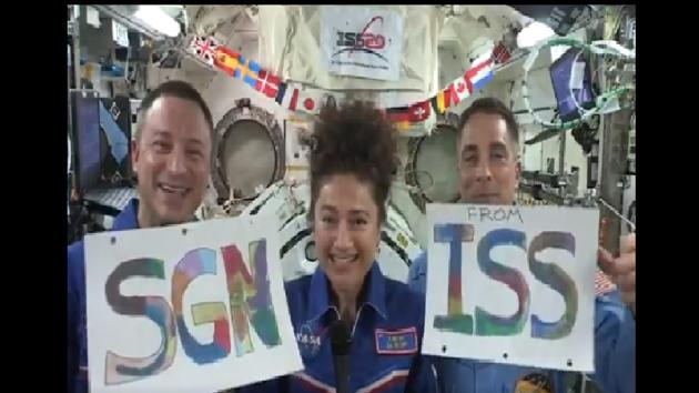Astronauts holding placards of Some Good News(SGN) from ISS.(Twitter/@NASA)