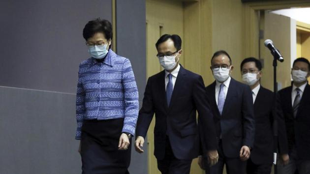 From left, Chief Executive Carrie Lam, Secretary for civil service Patrick Nip Tak-kuen, Secretary for Constitutional and Mainland Affairs Erick Tsang Kwok-wai, Secretary for Innovation and Technology Alfred Sit Wing-hang and Secretary for Home Affairs Caspar Tsui Ying-wai attend a news conference to announce the new appointed principal officials. (AP) From left, Chief Executive Carrie Lam, Secretary for civil service Patrick Nip Tak-kuen, Secretary for Constitutional and Mainland Affairs Erick Tsang Kwok-wai, Secretary for Innovation and Technology Alfred Sit Wing-hang and Secretary for Home Affairs Caspar Tsui Ying-wai attend a news conference to announce the new appointed principal officials. (AP)