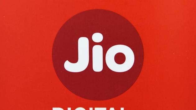 A JIO Telecom logo is seen at a mobile phone store in Mumbai.(AFP File)