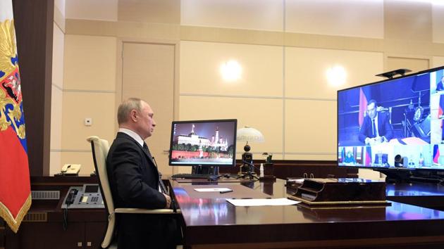 Russian President Vladimir Putin chairs a meeting with members of the Security Council via a video link at the Novo-Ogaryovo state residence outside Moscow, Russia. (REUTERS) Russian President Vladimir Putin chairs a meeting with members of the Security Council via a video link at the Novo-Ogaryovo state residence outside Moscow, Russia. (REUTERS)