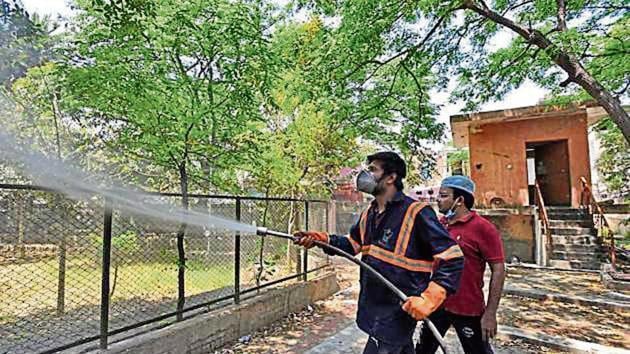 A sanitisation drive underway in Jamia Nagar. The govt will update the areas that need to be sanitised on a regular basis. (Burhaan Kinu/HT) A sanitisation drive underway in Jamia Nagar. The govt will update the areas that need to be sanitised on a regular basis. (Burhaan Kinu/HT)