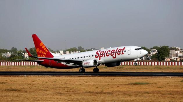 A SpiceJet passenger Boeing 737-800 aircraft takes off from Sardar Vallabhbhai Patel international airport in Ahmedabad, India. (REUTERS) A SpiceJet passenger Boeing 737-800 aircraft takes off from Sardar Vallabhbhai Patel international airport in Ahmedabad, India. (REUTERS)