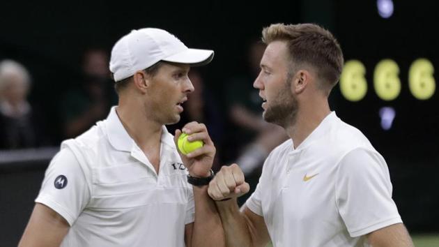 Mike Bryan and Jack Sock of the United States celebrate after winning a point. (AP) Mike Bryan and Jack Sock of the United States celebrate after winning a point. (AP)