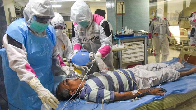 Medics take part in a mock drill as part of a preparation on how to handle Covid-19 cases in case of a rapid spread of the disease. (PTI) Medics take part in a mock drill as part of a preparation on how to handle Covid-19 cases in case of a rapid spread of the disease. (PTI)