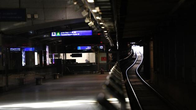 Metro tracks leading out of a deserted platform inside the Rajiv Chowk metro station during the lockdown, in New Delhi. (Ajay Aggarwal / HT Photo)