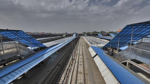 Stairs leading down to empty railway platforms at a deserted New Delhi Railway Station, during the lockdown. During this period, the Indian Railways that operated on a mammoth network ferrying 23 million passengers across 13,000 trains has only operated freight trains to supply essential commodities. (Burhaan Kinu / HT Photo)