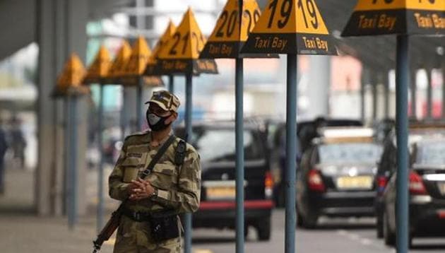 A security personnel wearing a facemask amid concerns over the spread of the COVID-19 novel coronavirus, stands guard outside at the Indira Gandhi International Airport in New Delhi on March 16, 2020. (AFP/ image for representation) A security personnel wearing a facemask amid concerns over the spread of the COVID-19 novel coronavirus, stands guard outside at the Indira Gandhi International Airport in New Delhi on March 16, 2020. (AFP/ image for representation)