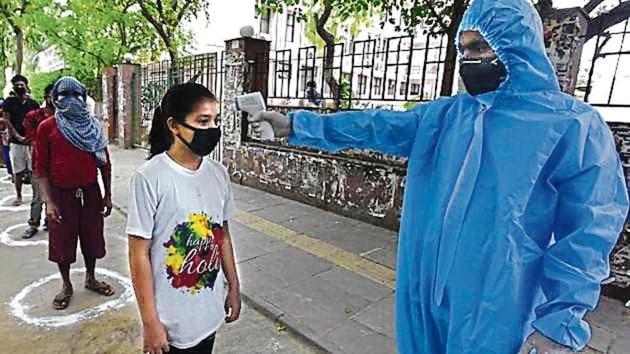 People being screened in New Delhi on Thursday.(Sonu Mehta/Ht Photo)