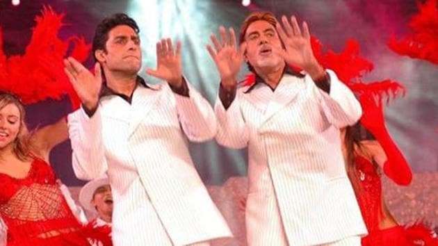 Abhishek Bachchan performs with dad Amitabh Bachchan at a charity show for to help those affected by the 2004 tsunami. Abhishek Bachchan performs with dad Amitabh Bachchan at a charity show for to help those affected by the 2004 tsunami.