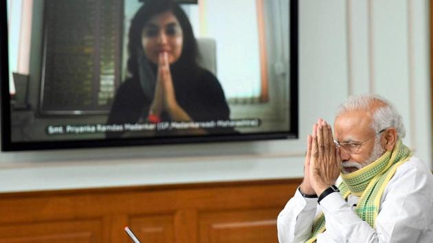 Prime Minister Narendra Modi interacts with the Sarpanchs from across the country on the occasion of the National Panchayati Raj Divas through video-conferencing in New Delhi on April 24, 2020. (PTI) Prime Minister Narendra Modi interacts with the Sarpanchs from across the country on the occasion of the National Panchayati Raj Divas through video-conferencing in New Delhi on April 24, 2020. (PTI)