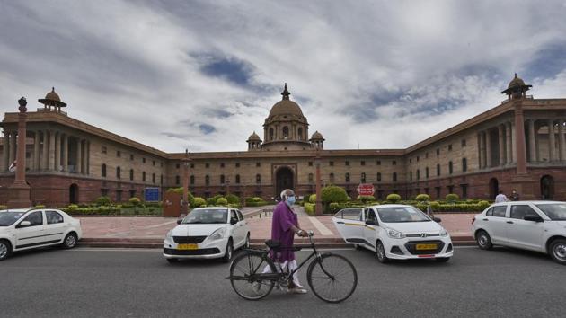 An elderly man walks along with his bicycle in the direction of the Prime Minister's office, at Raisina Hills, in New Delhi, India, on Monday, April 20, 2020. (Burhaan Kinu/HT PHOTO) An elderly man walks along with his bicycle in the direction of the Prime Minister's office, at Raisina Hills, in New Delhi, India, on Monday, April 20, 2020. (Burhaan Kinu/HT PHOTO)