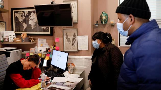 Lily Sage Weinrieb speaks with people trying to help their friend find an available space to conduct a funeral service for a deceased family member, during the outbreak. The death toll in the United States is now the highest in the world. A third of US deaths have been in New York City. (Andrew Kelly / REUTERS) Lily Sage Weinrieb speaks with people trying to help their friend find an available space to conduct a funeral service for a deceased family member, during the outbreak. The death toll in the United States is now the highest in the world. A third of US deaths have been in New York City. (Andrew Kelly / REUTERS)