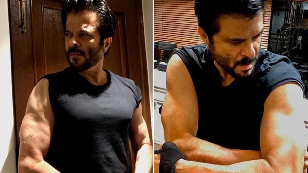 Anil Kapoor shows off his biceps. Anil Kapoor shows off his biceps.
