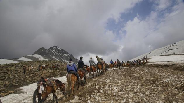 Pilgrims on their way to the holy cave shrine of Amarnath in Jammu and Kashmir. (PTI FILE PHOTO) Pilgrims on their way to the holy cave shrine of Amarnath in Jammu and Kashmir. (PTI FILE PHOTO)