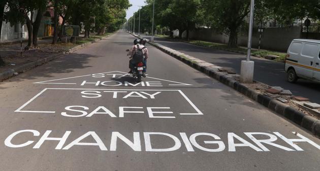 The Chandigarh Municipal Corporation’s latest move to paint the city roads with corona messages has left Chandigarhians divided. (Sanjeev Sharma /HT) The Chandigarh Municipal Corporation’s latest move to paint the city roads with corona messages has left Chandigarhians divided. (Sanjeev Sharma /HT)