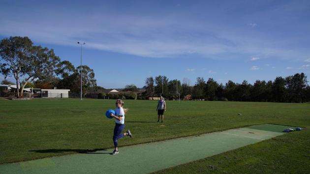 Kelsey-Lee Barber trains at a public park near her home in Canberra. Access to a proper facility like the one at the Australian Institute of Sport is limited due to precautions. (Loren Elliott / REUTERS)
