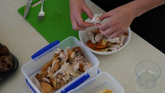 Javelin world champion Kelsey-Lee Barber prepares lunch at home following a training session geared toward the postponed Tokyo Olympic Games amidst the spread of the coronavirus disease (COVID-19), in Canberra, Australia. (Loren Elliott / REUTERS)