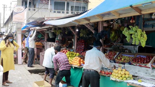 Shopkeepers close their fruit shops as they were opened without proper permission, amid the nationwide lockdown to control the spread of Covid-19, in Tezpur, Assam.(ANI)