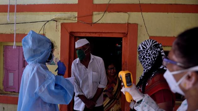 A medical screening organised for the residents of Koliwada, in Mumbai’ Dharavi, during Covid-19 lockdown, on Saturday. (Satish Bate/HT Photo) A medical screening organised for the residents of Koliwada, in Mumbai’ Dharavi, during Covid-19 lockdown, on Saturday. (Satish Bate/HT Photo)